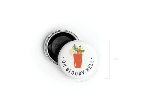The Onderkast Studio Oh Bloody Hell Bloody Mary Button Magnet is a 1.25-inch round magnet with a Bloody Mary illustration, celery, olive, lemon slice garnish, and OH BLOODY HELL text—perfect for adding flair to your fridge.