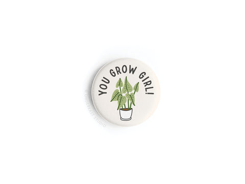 The Onderkast Studio You Grow Girl! Houseplant Button Magnet features an illustrated potted plant and uplifting text on a white background—perfect for plant lovers to showcase their green thumb.