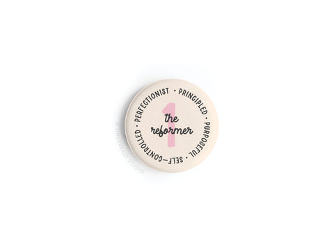 The Enneagram Button Magnet – 1 The Reformer by Onderkast Studio features a bold pink 1 with “the reformer” over it, capturing Type 1’s call for self-improvement. The edge reads: PERFECTIONIST · PRINCIPLED · PURPOSEFUL · SELF-CONTROLLED.