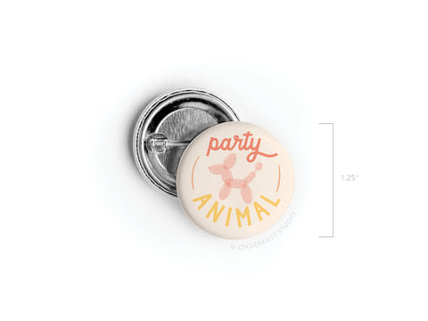 The Onderkast Studio Party Animal Pinback Button features vibrant party ANIMAL text in pink and yellow with a playful balloon animal, all on a 1.25-inch round pinback button.