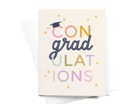 Celebrate academic achievements in style with the Onderkast Studio ConGradulations Greeting Card, featuring colorful letters, a graduation cap on the C, and cheerful yellow stars.