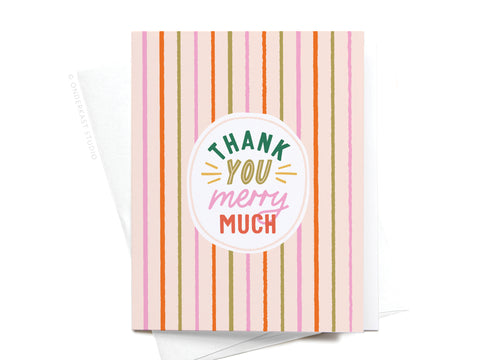 The Thank You Merry Much Greeting Card by Onderkast Studio features pink, orange, and brown vertical stripes with a white center circle. Its playful lettering and premium envelope add festive cheer to your message.