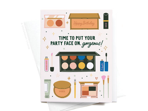 The Onderkast Studio Time to Put Your Party Face On Greeting Card features illustrated makeup essentials and the phrase “TIME TO PUT YOUR PARTY FACE ON, gorgeous!”—a perfect birthday or party card for beauty lovers.