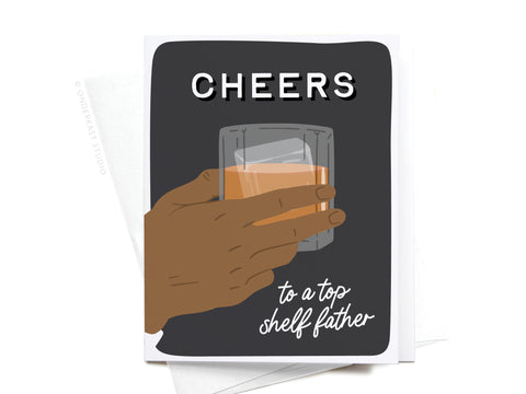 The Cheers to a Top Shelf Father Greeting Card by Onderkast Studio features a hand holding a whiskey glass with CHEERS on top and to a top shelf father below—an ideal Fathers Day card for someone truly special.