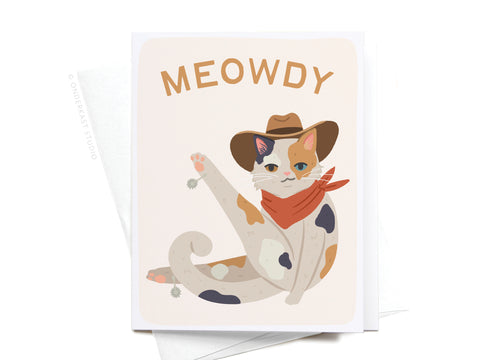 The Meowdy Greeting Card by Onderkast Studio features a calico cat with a cowboy hat and red bandana, paw raised, under bold MEOWDY text—a vibrant card perfect for cat lovers. Color: Calico.