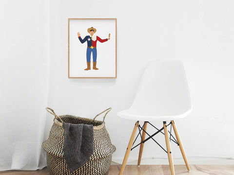 A minimal room features a white chair, a woven basket with a dark blanket, and Onderkast Studios Big Tex Art Print—a true Texas icon—framed on the white wall.