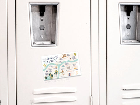 The Onderkast Studio Fort Worth Map Refrigerator Magnet, featuring Texas landmarks and local attractions, is displayed on a white metal locker.