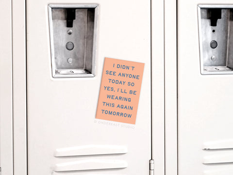 The Onderkast Studio Wearing This Again Tomorrow Refrigerator Magnet features the witty phrase “I didn’t see anyone today so yes, I’ll be wearing this again tomorrow”—a fun touch for your fridge or wardrobe area.