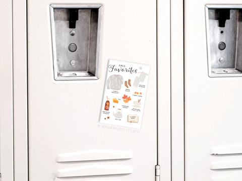 The Fall Favorites Refrigerator Magnet by Onderkast Studio features autumn-themed illustrations like sweaters, boots, leaves, and pumpkins—making it the perfect seasonal decor for any space.