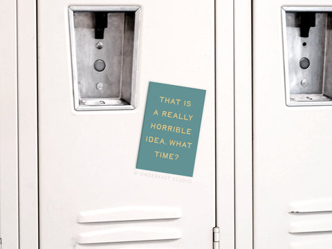 The Onderkast Studio Really Horrible Idea Refrigerator Magnet, shown on a white locker, features the phrase THAT IS A REALLY HORRIBLE IDEA. WHAT TIME? in yellow on teal—USA made and perfectly humorous for any space.