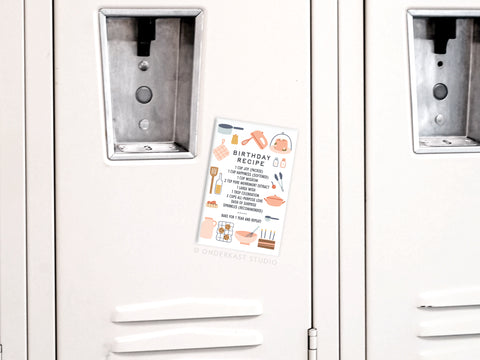 The Onderkast Studio Birthday Recipe Refrigerator Magnet features charming kitchen utensil illustrations and a pastel design, displaying ingredients and instructions under the Birthday Recipe title—a perfect accent for any white locker.