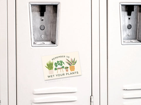 Add a fun reminder to your white locker with the Onderkast Studio Remember to Wet Your Plants Refrigerator Magnet, featuring playful houseplant illustrations and witty text—perfect for plant lovers and stylish decor.