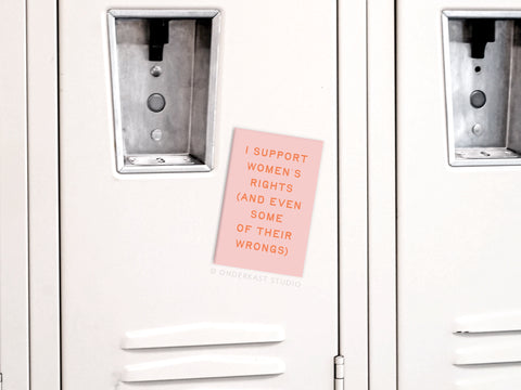 The Onderkast Studio I Support Women’s Rights Refrigerator Magnet is shown on a white locker, featuring the bold red text: I SUPPORT WOMENS RIGHTS (AND EVEN SOME OF THEIR WRONGS). The locker has a secure handle and lock.