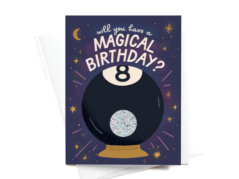 The Magic 8-Ball Birthday Scratch-Off Greeting Card by Onderkast Studio features a sparkling Magic 8-Ball with stars and “Will you have a MAGICAL BIRTHDAY?” on a dark purple background.