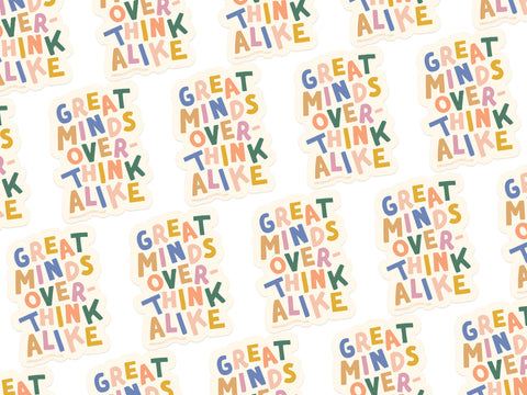 A playful, colorful pattern of Great Minds Overthink Alike Stickers by Onderkast Studio on white. Each weatherproof vinyl sticker features bright, informal lettering and is printed in the USA for lasting fun.