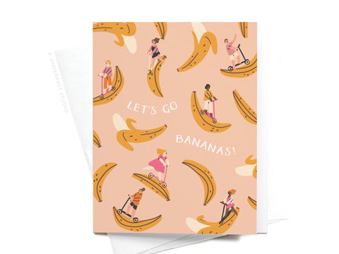 The Lets Go Bananas Greeting Card – FINAL STOCK by Onderkast Studio showcases a lively scene of people on scooters dodging banana peels, set against a peach background—perfect for adding playful charm to any occasion!.