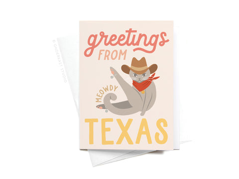 The “Greetings From Texas Meowdy Sticker Greeting Card” by Onderkast Studio features a cowboy cat and fun text on white card stock—perfect to pair with your favorite vinyl sticker.