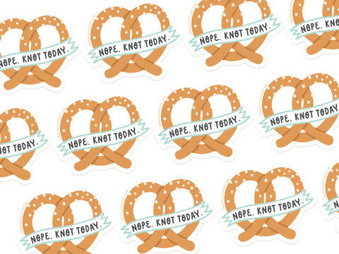 The Nope Knot Today Pretzel Sticker by Onderkast Studio features a repeating pattern of golden-brown pretzels with white salt specks and banners reading, NOPE. KNOT TODAY. Its a fun, water-resistant vinyl design.