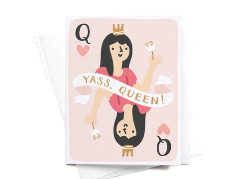 The Yass, Queen! Greeting Card – FINAL STOCK by Onderkast Studio features a queen holding a crown and a YASS, QUEEN! banner, with pink hearts and Qs in the corners—an empowering friendship card with premium style.