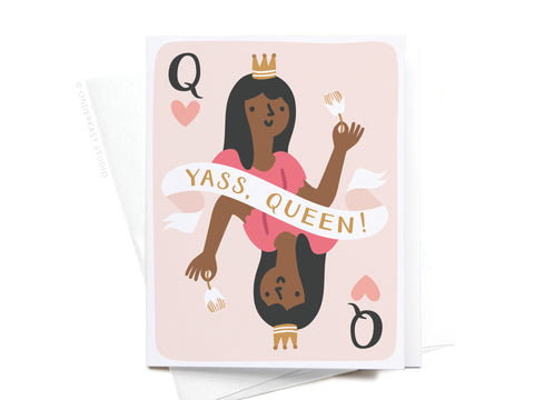 Celebrate your favorite queen with the Yass, Queen! Greeting Card – FINAL STOCK by Onderkast Studio, featuring a dark-skinned queen with cake and crown, YASS, QUEEN! white ribbon, pink hearts, and black Qs—a premium card for friendship empowerment.