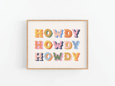Onderkast Studio’s Howdy Howdy Howdy Art Print showcases “HOWDY” repeated in bold, colorful letters on a white background, with each row in a unique palette for a playful Western vibe.