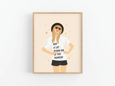 TS Red Art Print by Onderkast Studio features a woman in a black hat, red heart sunglasses, and a Not a lot going on at the moment T-shirt—channeling Taylor Swift’s iconic style. A must-have for fans!.