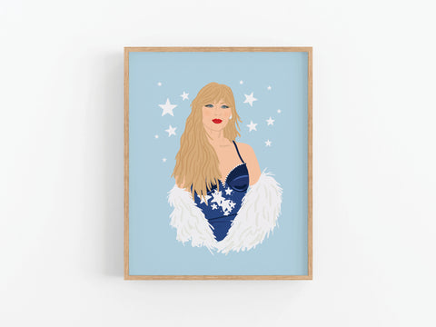 The TS Midnights Art Print by Onderkast Studio features a woman with long blonde hair in a dark blue dress and white feathered shawl, set against a light blue background with white stars—a striking modern wall art piece.