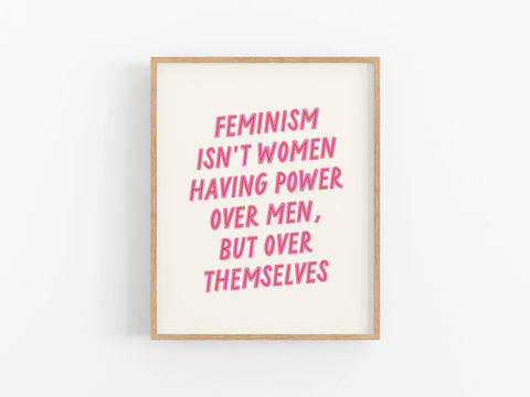 The Onderkast Studio Feminism Art Print features pink text, “Feminism isn’t women having power over men, but over themselves,” in a minimalist design on white—perfect for celebrating female empowerment.