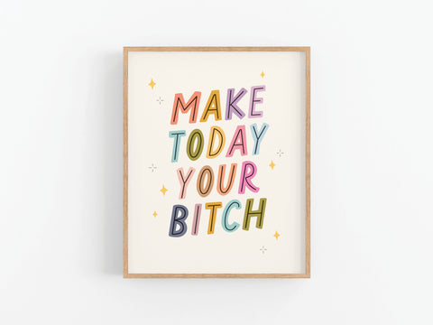 The Make Today Your Bitch Art Print by Onderkast Studio features bold, colorful text and yellow stars on a white background—perfect motivational wall decor to inspire your home workspace.