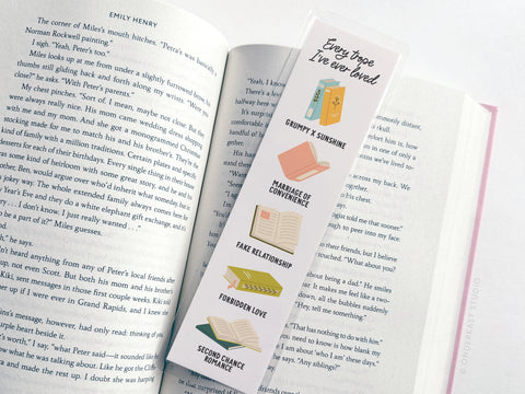 The Every Trope Ive Ever Loved Laminated Bookmark by Easyhand Goods features colorful romance trope illustrations—grumpy x sunshine, marriage of convenience, fake relationship, forbidden love, second chance romance—perfect for any book lover.