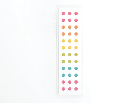 The Easyhand Goods Button Candy Laminated Bookmark features rows of small, round candy dots in a rainbow pattern printed on a crisp white background, resembling classic button candy.