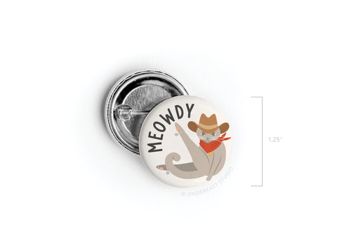 The Meowdy Pinback Button by Onderkast Studio is a 1.25 accessory showing a cartoon cat in a cowboy hat and red bandana, paw raised, with MEOWDY above. Perfect for cat lovers, its proudly printed in the USA.