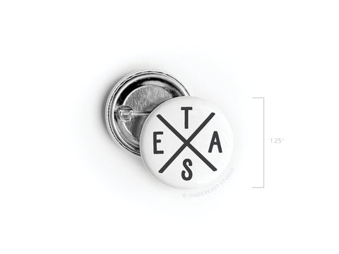 The Onderkast Studio Texas Logo Pinback Button showcases black E, A, T, and S around a black X on white. This iconic round button measures 1.25 inches in diameter.