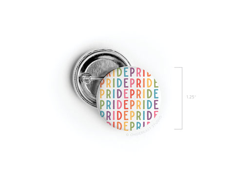 The Onderkast Studio Pride Pinback Button measures 1.25 across and features the word PRIDE in rainbow colors, shown open to reveal its pin mechanism—a vibrant symbol of solidarity.