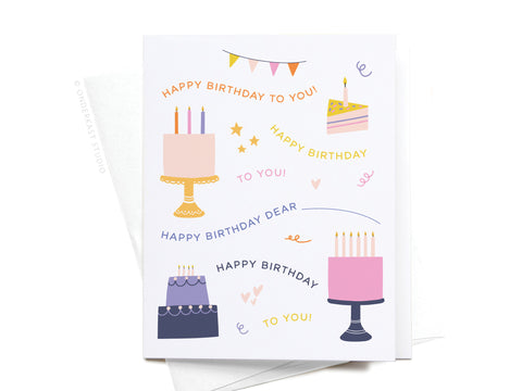 The Happy Birthday Song Greeting Card by Onderkast Studio features cakes, candles, banners, stars, and confetti with colorful “HAPPY BIRTHDAY TO YOU!” lettering inspired by the song—perfect for a festive celebration.