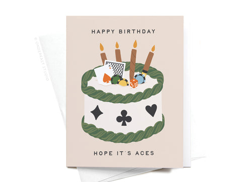 The Aces Poker Birthday Greeting Card by Onderkast Studio features a cake decorated with playing cards, poker chips, and four candles, plus HAPPY BIRTHDAY and HOPE ITS ACES for a premium touch—perfect for any poker fan.