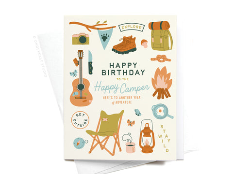 The Happy Birthday to the Happy Camper Greeting Card by Onderkast Studio features camping-themed illustrations—perfect for gifting outdoorsy birthday card lovers.