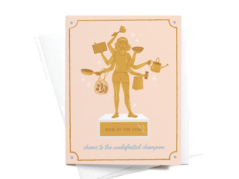 The Mom of the Year Trophy Greeting Card by Onderkast Studio features an illustrated woman with multiple arms juggling tasks atop a trophy. Text reads, cheers to the undefeated champion—perfect for Mother’s Day.