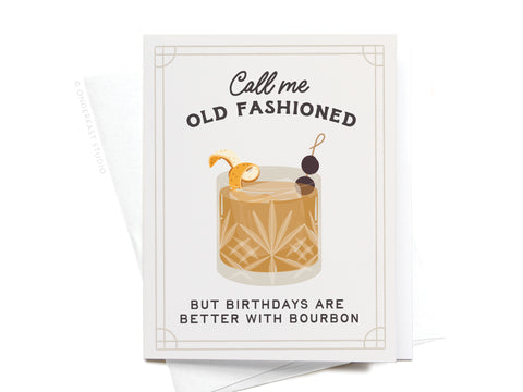The Call Me Old Fashioned Cocktail Greeting Card by Onderkast Studio features an Old Fashioned with orange peel and cherries, plus the message: Call me OLD FASHIONED, but birthdays are better with bourbon. Perfect for cocktail lovers.