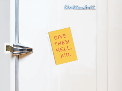 The Give Them Hell Kid Refrigerator Magnet from Onderkast Studio holds a yellow note with bright colors and red “GIVE THEM HELL, KID.” text on the white retro Elektrobit fridge.