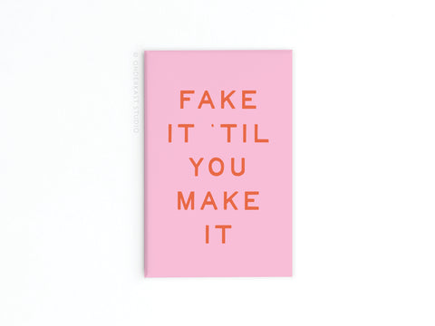The Onderkast Studio Fake It Til You Make It Refrigerator Magnet features bold orange text on a pink rectangular board—a cheerful reminder to boost your confidence with this playful mantra.