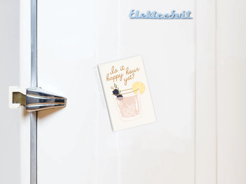 A vibrantly colored Is It Happy Hour Yet Cocktail refrigerator magnet by Onderkast Studio features a stylish cocktail illustration and pops on any fridge.