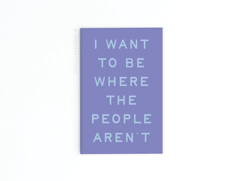 The Be Where the People Aren’t Refrigerator Magnet by Onderkast Studio features lavender coloring and light blue text on a white background, ideal for adding a touch of solitude humor to your fridge.