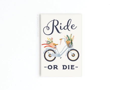 The Ride Or Die Bicycle Refrigerator Magnet by Onderkast Studio features a vintage-inspired design with a floral bicycle graphic and Ride or Die script—an ideal cycling-themed accent for your kitchen.
