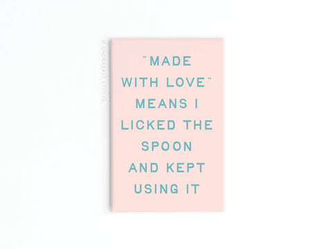 The Onderkast Studio Licked the Spoon Refrigerator Magnet features a vibrant light pink design with teal text: “MADE WITH LOVE” MEANS I LICKED THE SPOON AND KEPT USING IT—perfect for adding humor to your baking space or fridge.