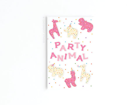 The Onderkast Studio Party Animal Frosted Animal Cookies Refrigerator Magnet features Party Animal in pink, cute animals in party hats, colorful confetti, and a vibrant white background—perfect for your fridge!.