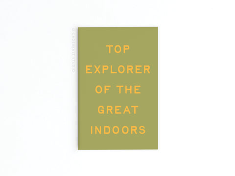 The Onderkast Studio Explorer of the Great Indoors Refrigerator Magnet features vibrant yellow text on green, reading TOP EXPLORER OF THE GREAT INDOORS, displayed against a plain white background.