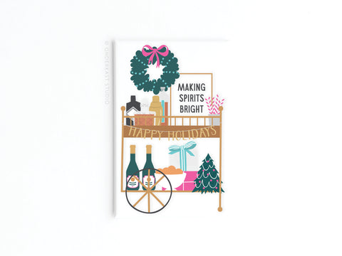 Add festive cheer to your fridge with the Onderkast Studio Making Spirits Bright Bar Cart Magnet, featuring bottles, glasses, gifts, a wreath, and a “HAPPY HOLIDAYS” gold banner—perfect for holiday décor.