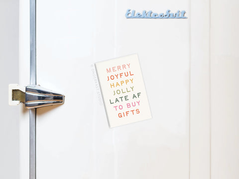 The Merry Joyful Late to Buy Gifts Refrigerator Magnet by Onderkast Studio adds a playful holiday touch to your fridge with its colorful MERRY JOYFUL HAPPY JOLLY LATE AF TO BUY GIFTS sign, printed in the USA.