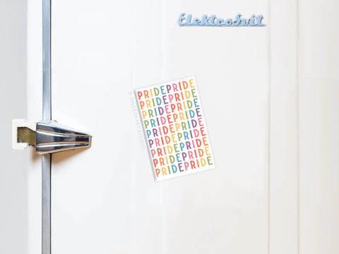 A white fridge with a vintage handle displays the Pride Refrigerator Magnet by Onderkast Studio, featuring colorful “PRIDE” lettering—a symbol of LGBTQ+ unity. The word “Elektrobrüt” appears at the top right of the fridge.